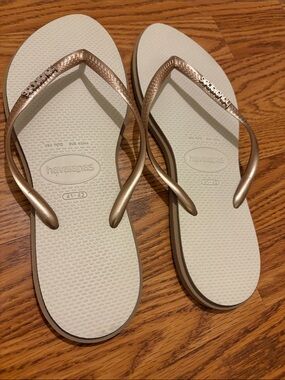 Havaianas Women's Cream Flip Flops with Metallic Gold Straps